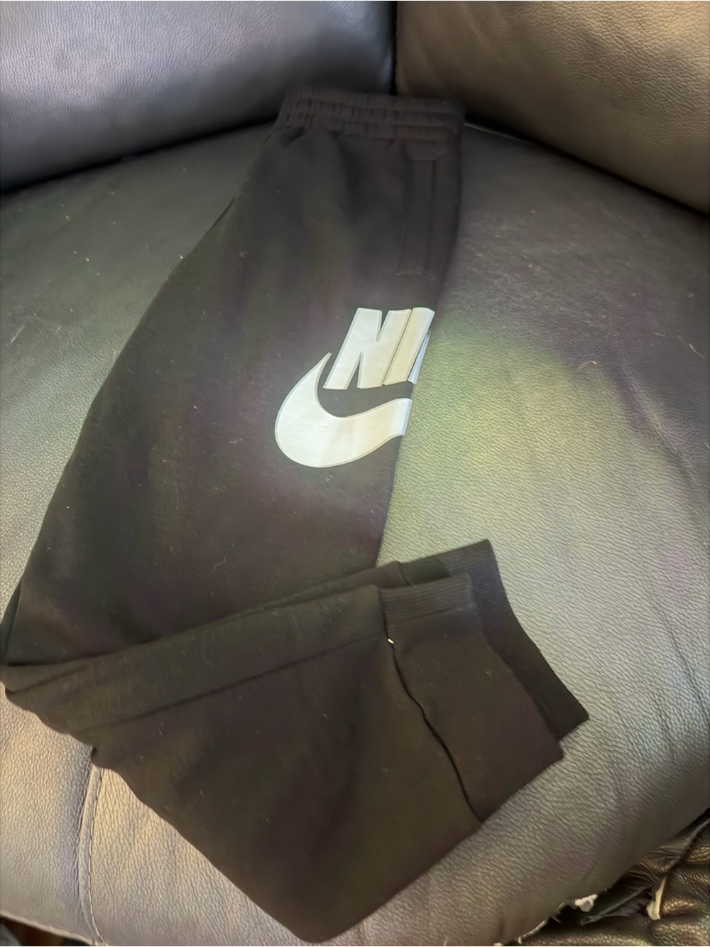Nike Black Sweatpants with White Swoosh Logo